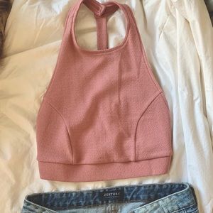 Open-backed, soft textured pink crop tank